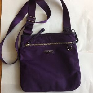 Tumi nylon purple crossbody with silver hardware